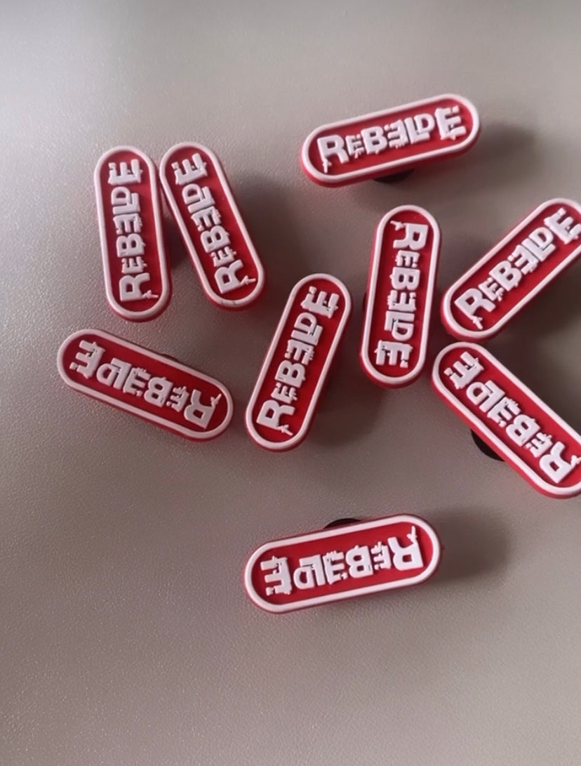 Rebelde charms