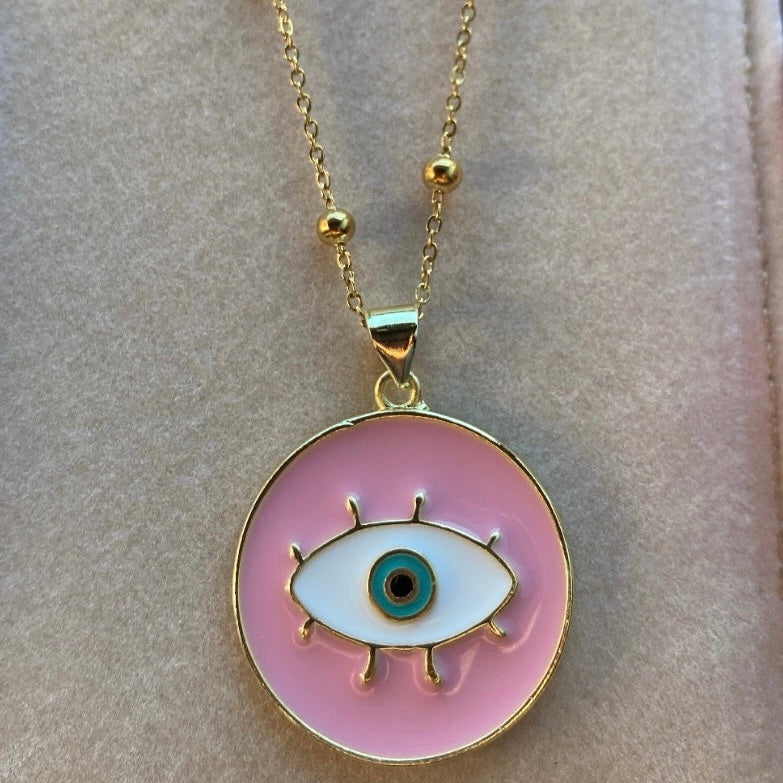 Pink ojo pendant necklace