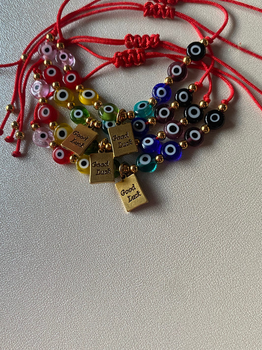 Good luck protection bracelet with colorful ojitos