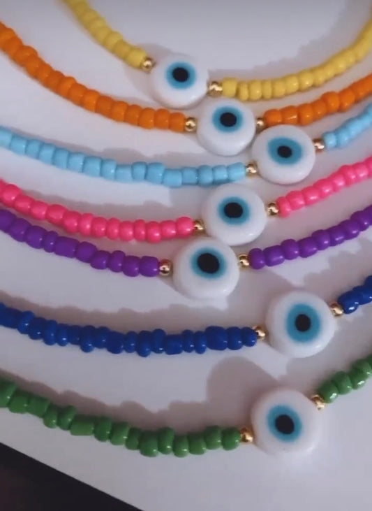 Colored ojito necklaces