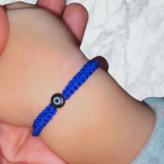 Hand made ojito braided bracelet in blue